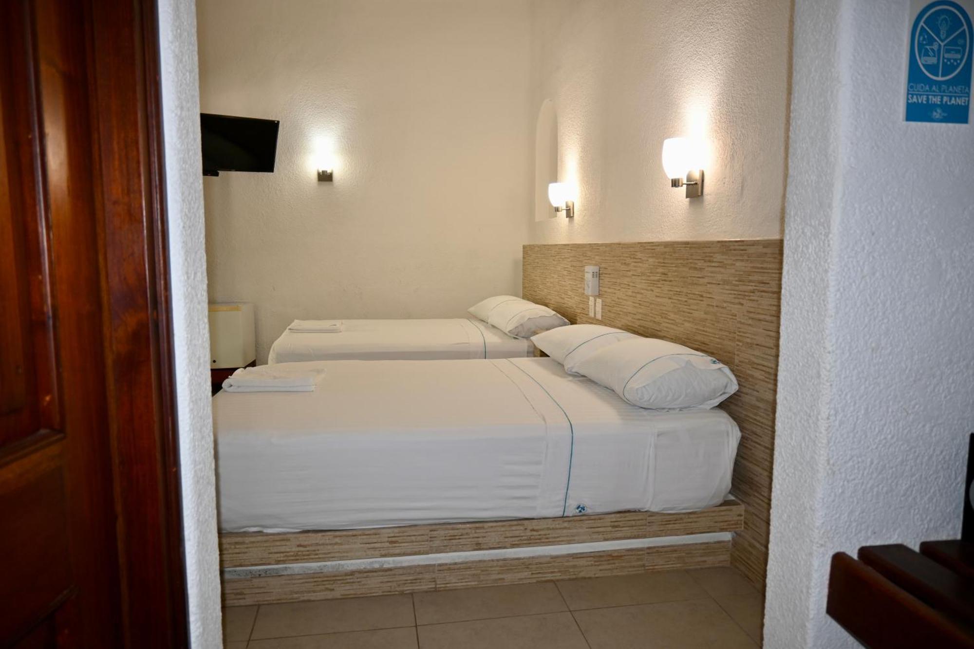 Pelicano Inn Playa Del Carmen - Beachfront Hotel Kültér fotó